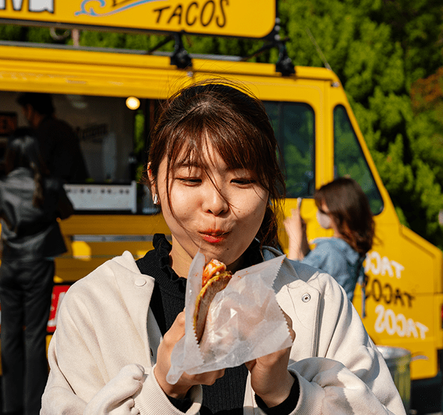 woman eating taco