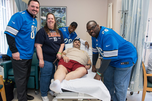 James and Patty Vasquez meet Lion's players