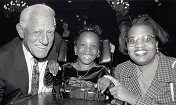 Sparky Anderson posed with girl and mother