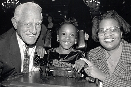 Sparky Anderson posed with girl and mother