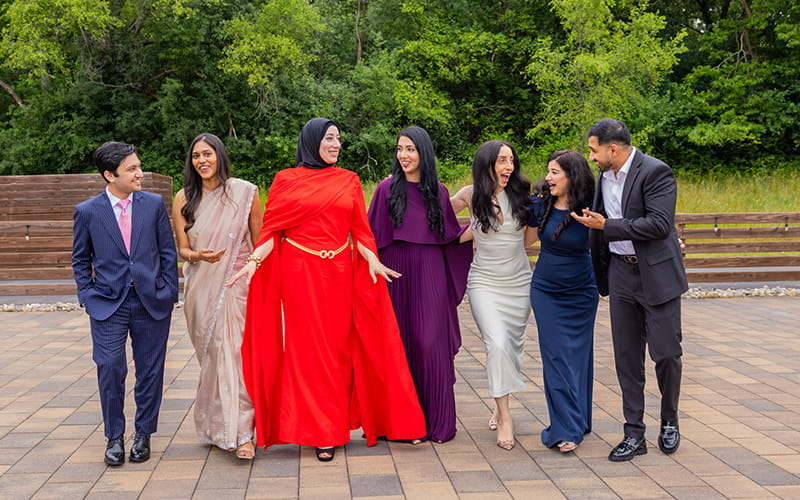 Group of residents outside dressed in evening wear