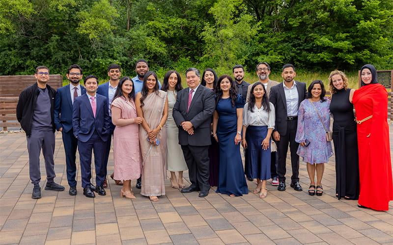 Group picture of residents and guests at an event.