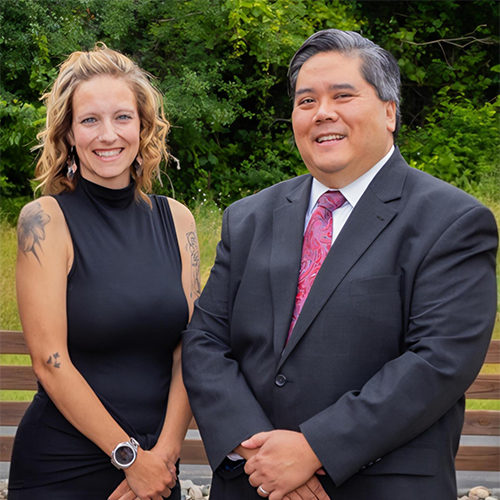 Dawn Heins and Dr. Santos posing for a picture at an event.