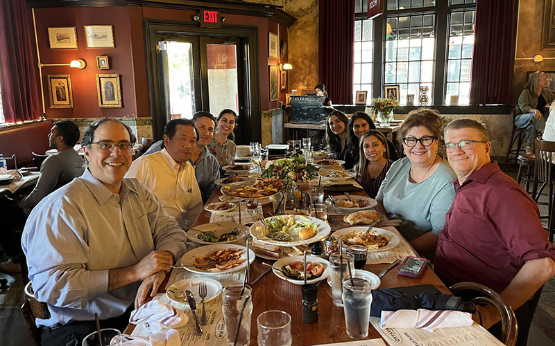 Fellows and faculty at dinner