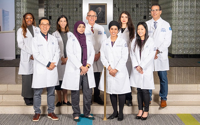 Maternal Fetal Medicine Faculty group wearing white coats