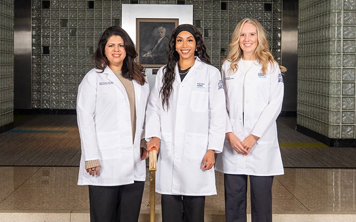 Maternal Fetal Medicine Fellows group wearing white coats