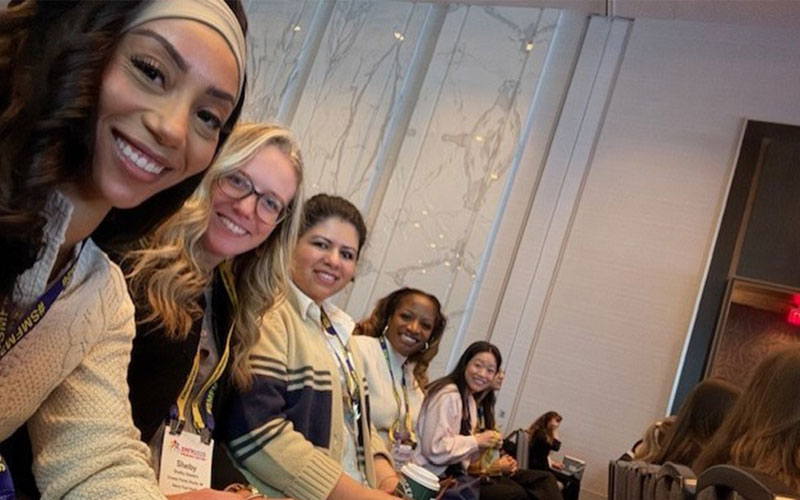 Maternal Fetal Medicine group photo of team at an event