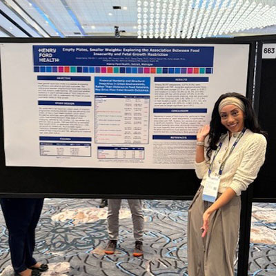 Dr Karrar presenting-her-poster-at-SMFM-2025