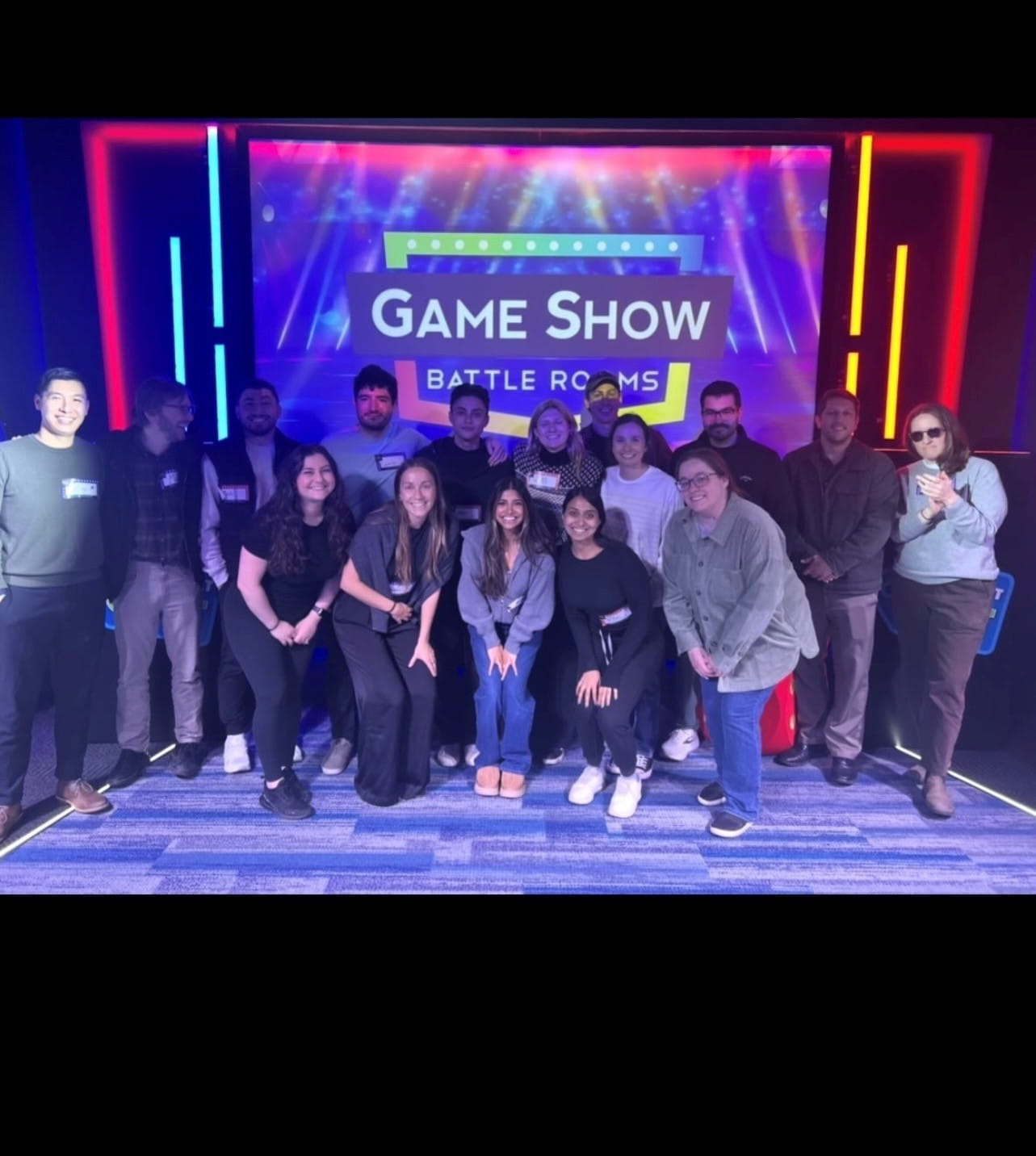 Group photo at wellness game show battle rooms