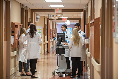 Residents having a discussion in the hall