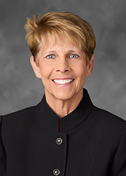 Portrait of Kelly Baird-Cox