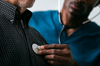 Respiratory therapist providing patient care