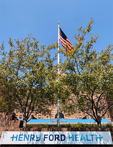 Henry Ford St. John Hospital exterior USA flag view