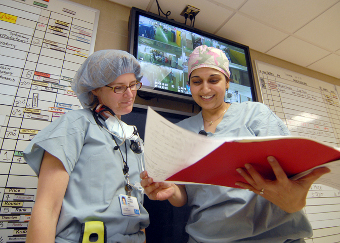 Anesthesiologists looking over a chart at Henry Ford Health