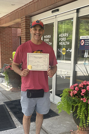 Ron outside Henry Ford Health