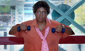 Women Using Hand Weights