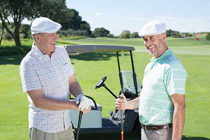 two male golfers out on the course