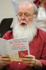 Gary Healey, heart patient at Henry Ford Health, singing Christmas carols
