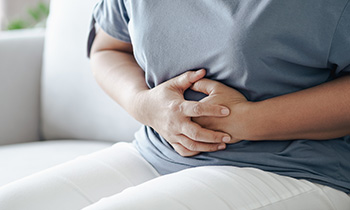 woman with stomach pain