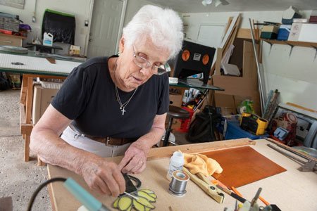 carole working on stained glass