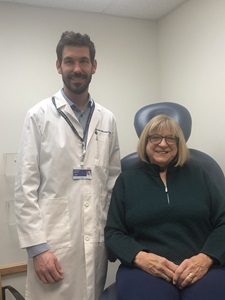 Patient Jackie Wilborn and Dr. Andrew Mastay at appointment in clinic.