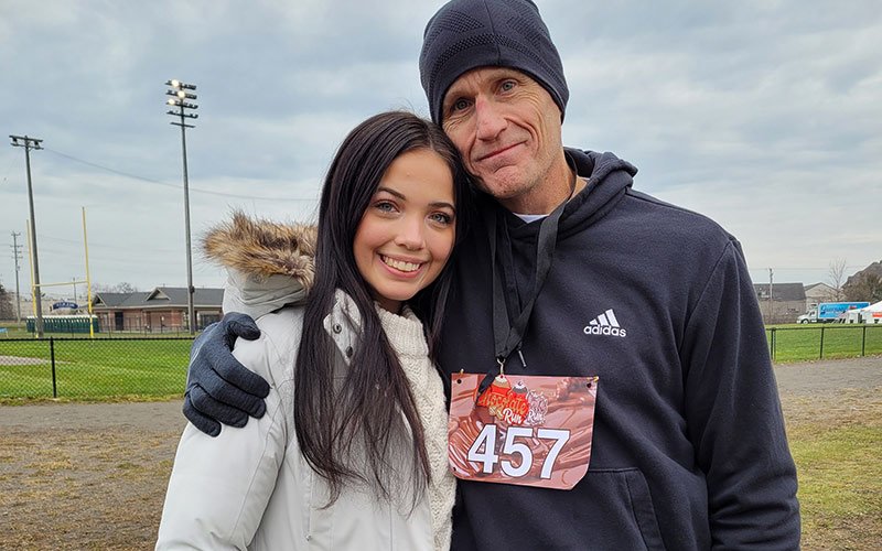 dennis post race with daughter