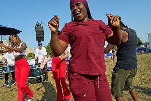 A Henry Ford Health team members dances