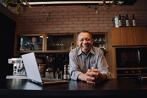 Stock image of smiling small business owner